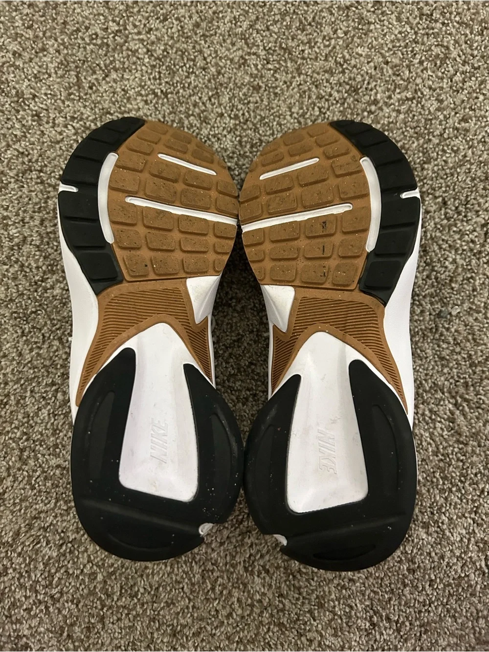 Woman’s White and Tan Athletic Sneakers